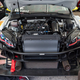 The Golf GTI TCR with its front end off.